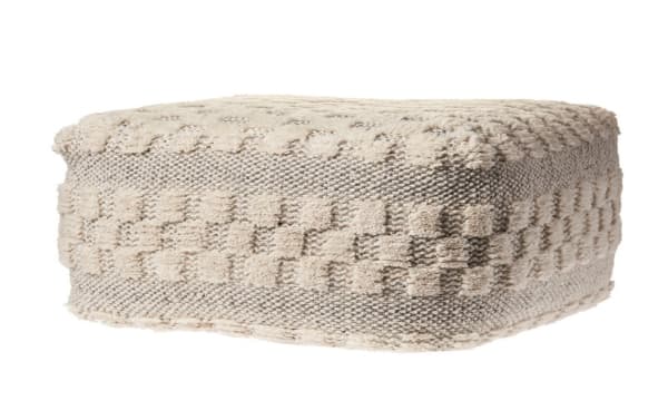 Cream-colored Bello Cream Pouf with textured wool upholstery, mid-century modern style, handcrafted with a durable cotton-polyester blend.