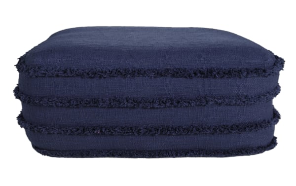 Thea Navy Pouf in deep navy blue cotton fabric with textured horizontal fringe stripes, a contemporary square ottoman for living rooms or bedrooms.