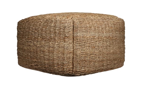 Round Esme Brown Pouf in farmhouse style, handcrafted from woven jute in warm brown tones, ideal as footrest or extra seating.