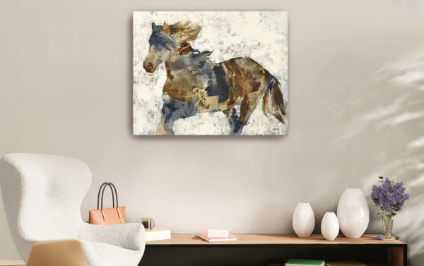 Abstract horse painting with blue, brown, and beige tones on a textured white background, displayed above a modern wooden console with vases and a white armchair.