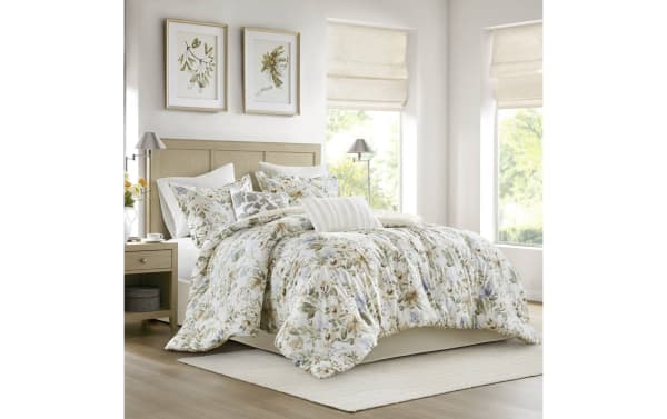 Botanical Bliss Queen Ivory 6 Piece Comforter Set with floral print in beige, brown, green, and blue. Made of cotton and polyester fabric with a contemporary style, featuring dash-stitching and bartack design for durability and comfort.