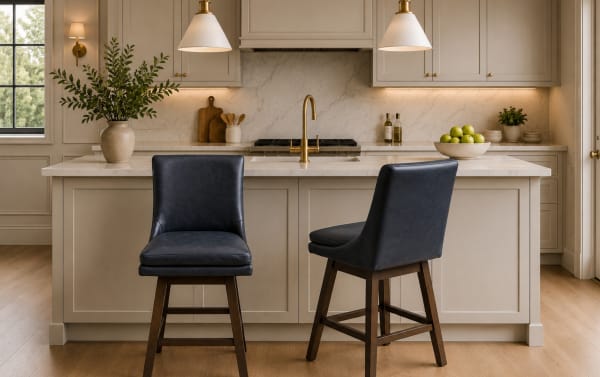 Set of 2 Elio Black faux leather swivel bar stools with solid backs, rubberwood frames, and transitional style, ideal for kitchen islands.