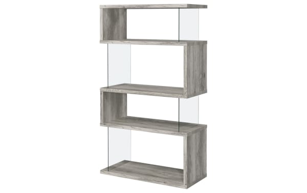 Dante 63'' gray contemporary 4-shelf bookcase with asymmetrical MDF and melamine wood design, tempered glass side panels, and flush base for stability.