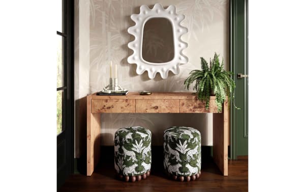 Contemporary Addyson Green Leopard Ottoman in green and white polyester fabric with solid rubberwood orb base, perfect for extra seating or footrest.
