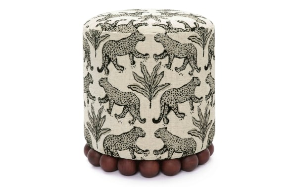 Addyson Cream Leopard Ottoman with black leopard print on cream polyester fabric, contemporary style, solid rubberwood orb base, tan upholstery.