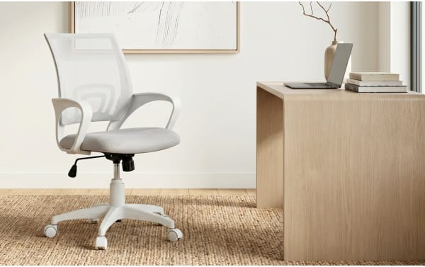 Lexi White Adjustable Swivel Mesh Office Chair with breathable white mesh back, padded seat, height and tilt adjustments, and five-point caster base for home office.