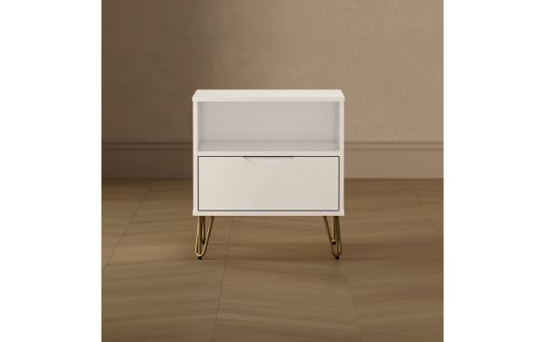 White modern nightstand with a single drawer and open shelf, featuring gold metal hairpin legs, ideal for bedroom storage and decor.