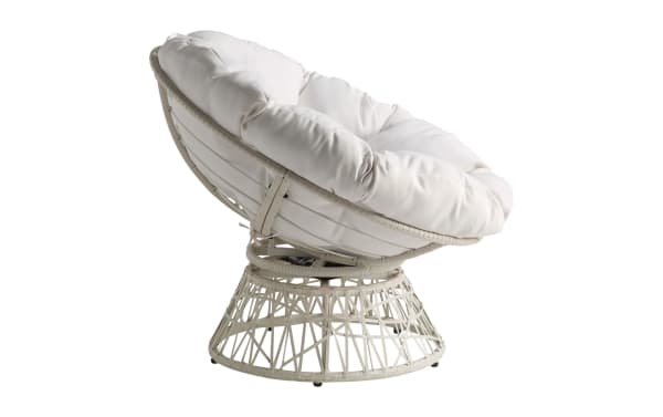 White cushioned papasan chair with a round rattan frame and plush tufted fabric seat, designed for comfortable indoor seating.