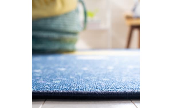 Low-profile navy blue Orbit Adventure 2' x 6' fabric runner with playful transitional style, durable polyamide, and smooth synthetic upholstery.
