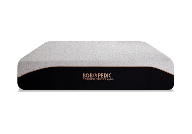 Bobopedic Copper Sport Hybrid mattress with white patterned top and black base, featuring copper-infused memory foam for enhanced comfort and support.