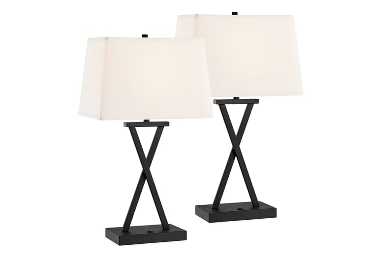 Set of two modern table lamps with black metal X-shaped bases and rectangular white fabric shades, ideal for contemporary home decor.