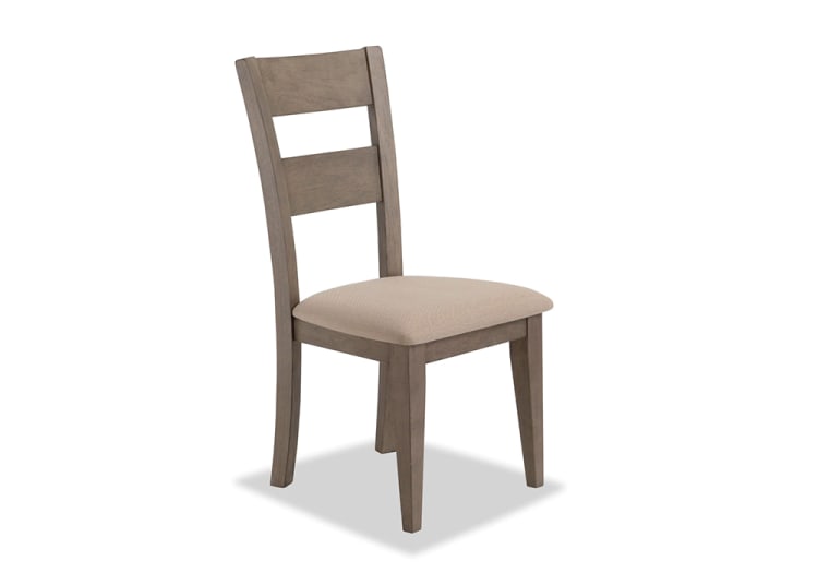 Wooden dining chair with a grayish-brown finish, featuring a padded beige fabric seat and a two-slat curved backrest for comfort and style.