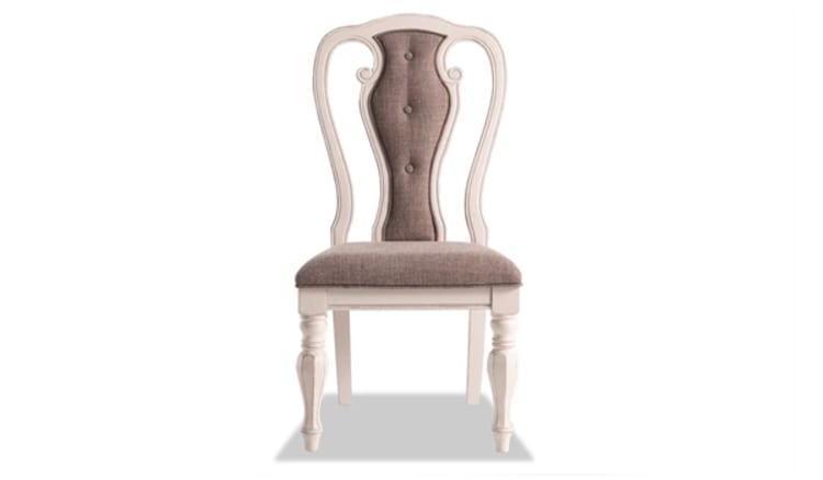 Classic wooden dining chair with white painted frame, beige upholstered cushioned seat and tufted backrest, featuring curved legs and vintage design.