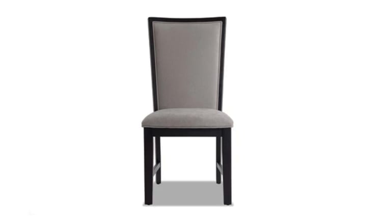 Upholstered dining chair with gray fabric seat and backrest, dark wooden frame, and tapered legs, suitable for modern dining rooms.