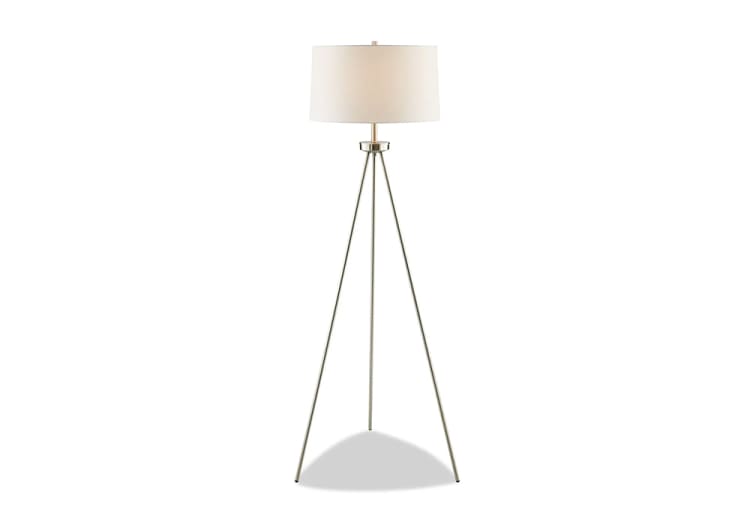 Modern tripod floor lamp with a brushed metal frame and a white fabric drum shade, ideal for living room or office lighting.