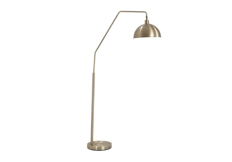 Modern brushed nickel floor lamp with adjustable arm and dome-shaped shade, ideal for living room or office lighting.