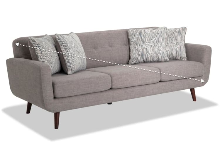 Modern mid-century style gray fabric sofa with wooden tapered legs, three seat cushions, and patterned accent pillows, suitable for living room seating.