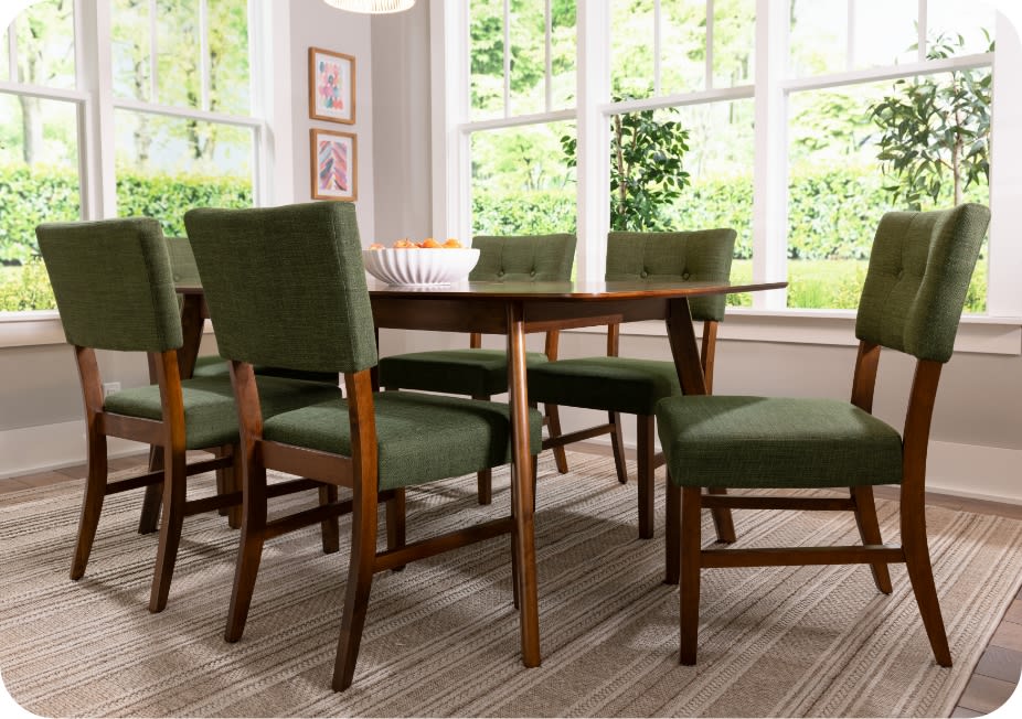 7 piece brown dining set with green upholstered chairs