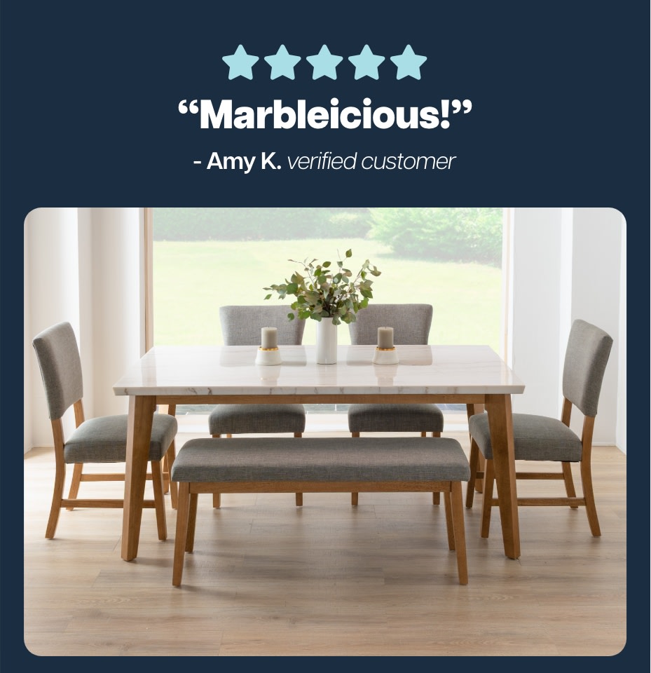 White and natural dining table set with marble top, 4 chairs, and a bench. Text reads: Marbleicious! Amy K. - verified customer