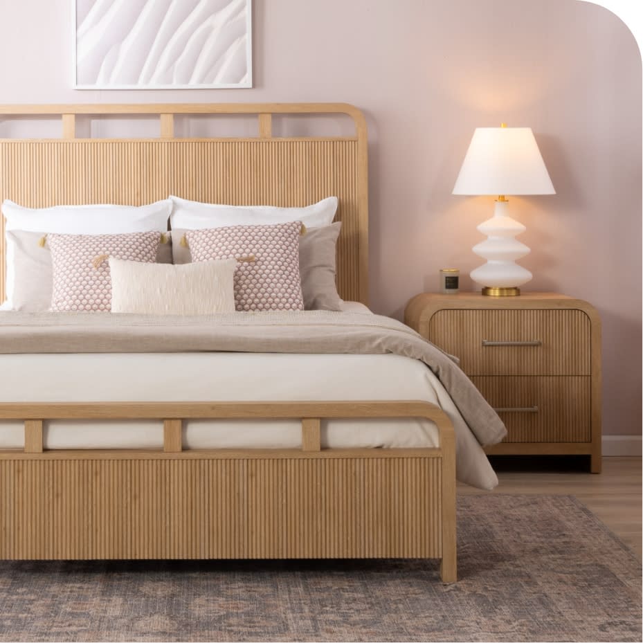 Light brown bed and nightstand.