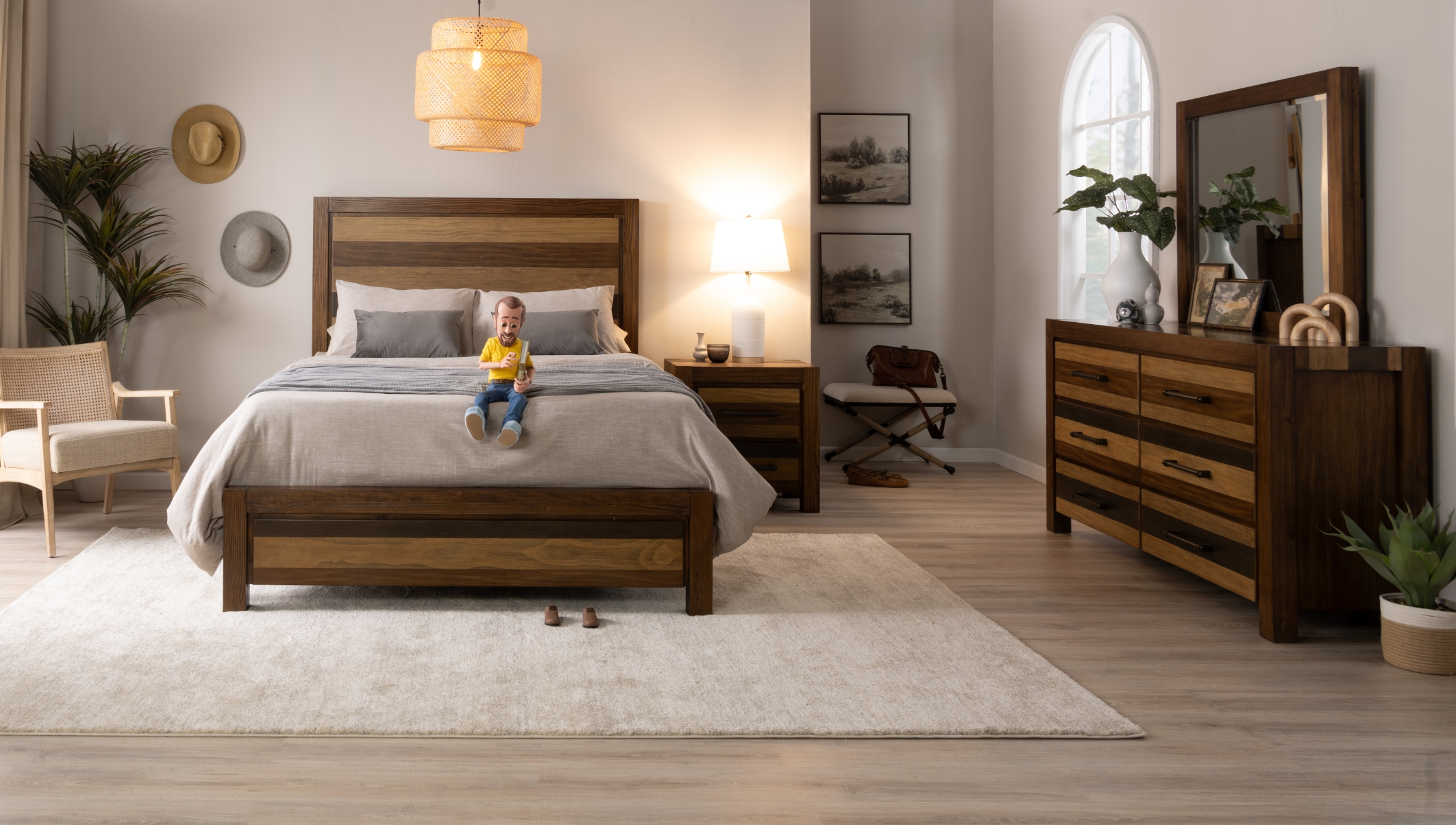 Rustic bedroom set made from solid pine with striped paneling in different shades of brown, showcasing a bed with headboard, 6 drawer dresser with mirror, 2 drawer nightstand with white lamp, all sitting on a beige wood floor with white area rug.