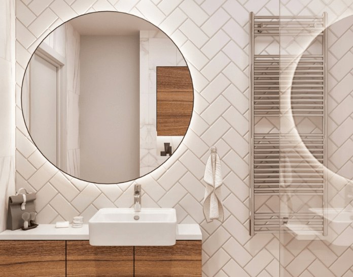 salle de douche moderne avec miroir circulaire