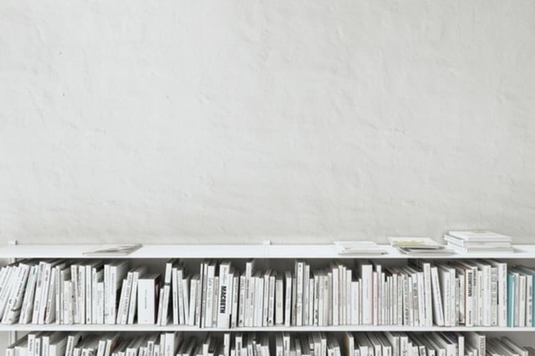 Bookshelves Packed with Books by Anna Titova Source: Icons8