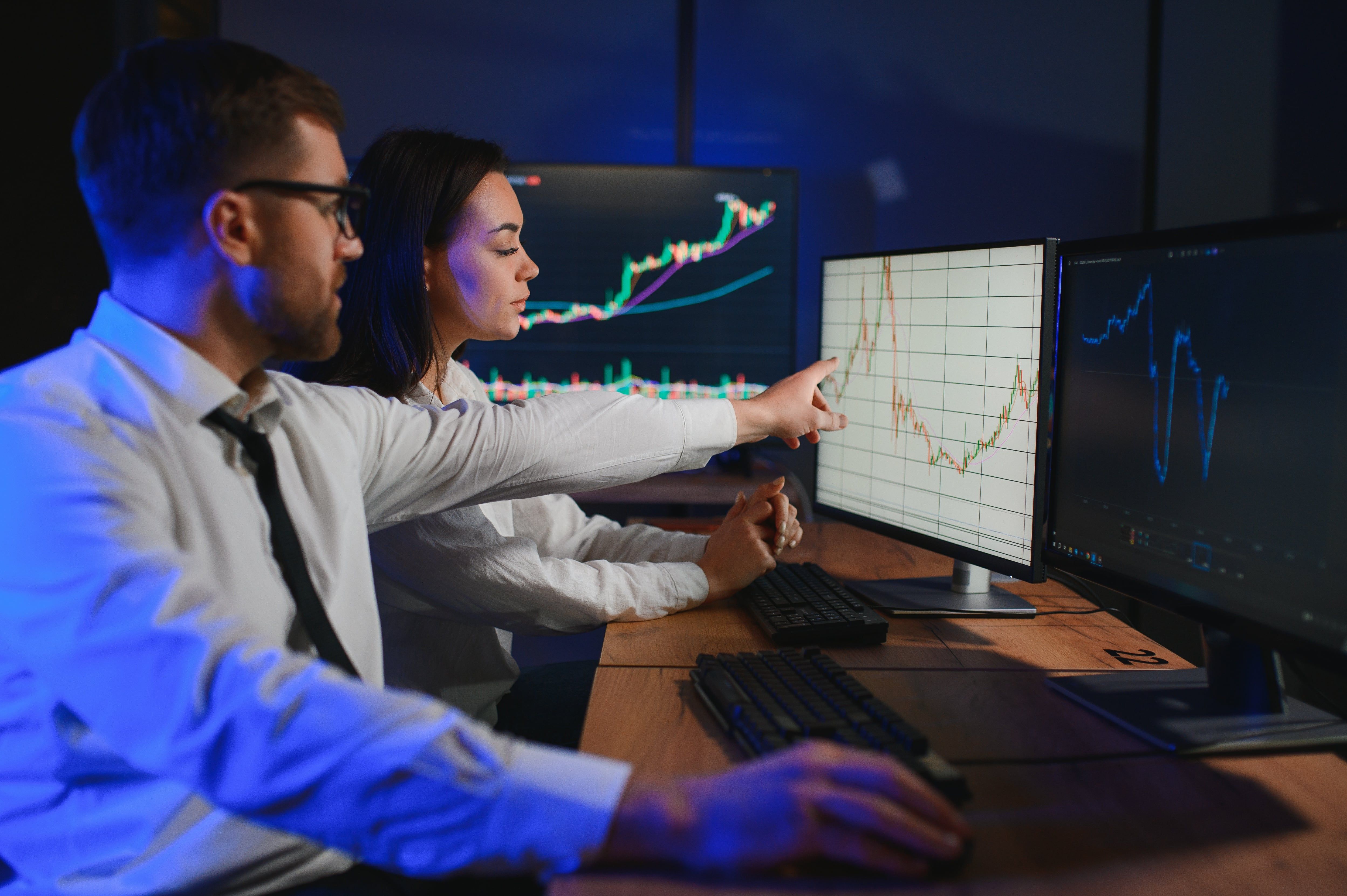 business-team-investment-working-with-computer-planning-analyzing-graph-stock-market-trading.jpg