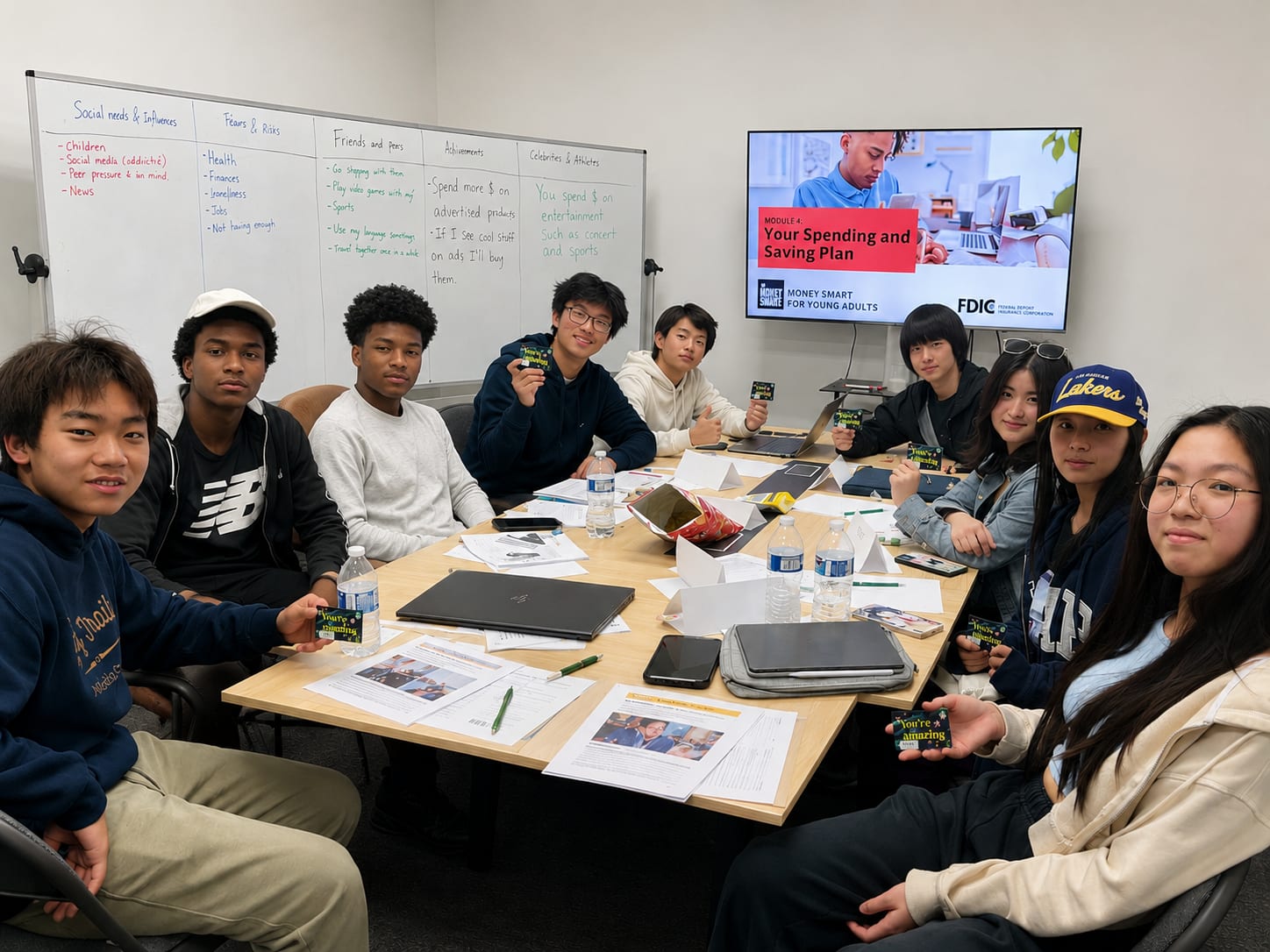 Students in a classroom learning financial literacy