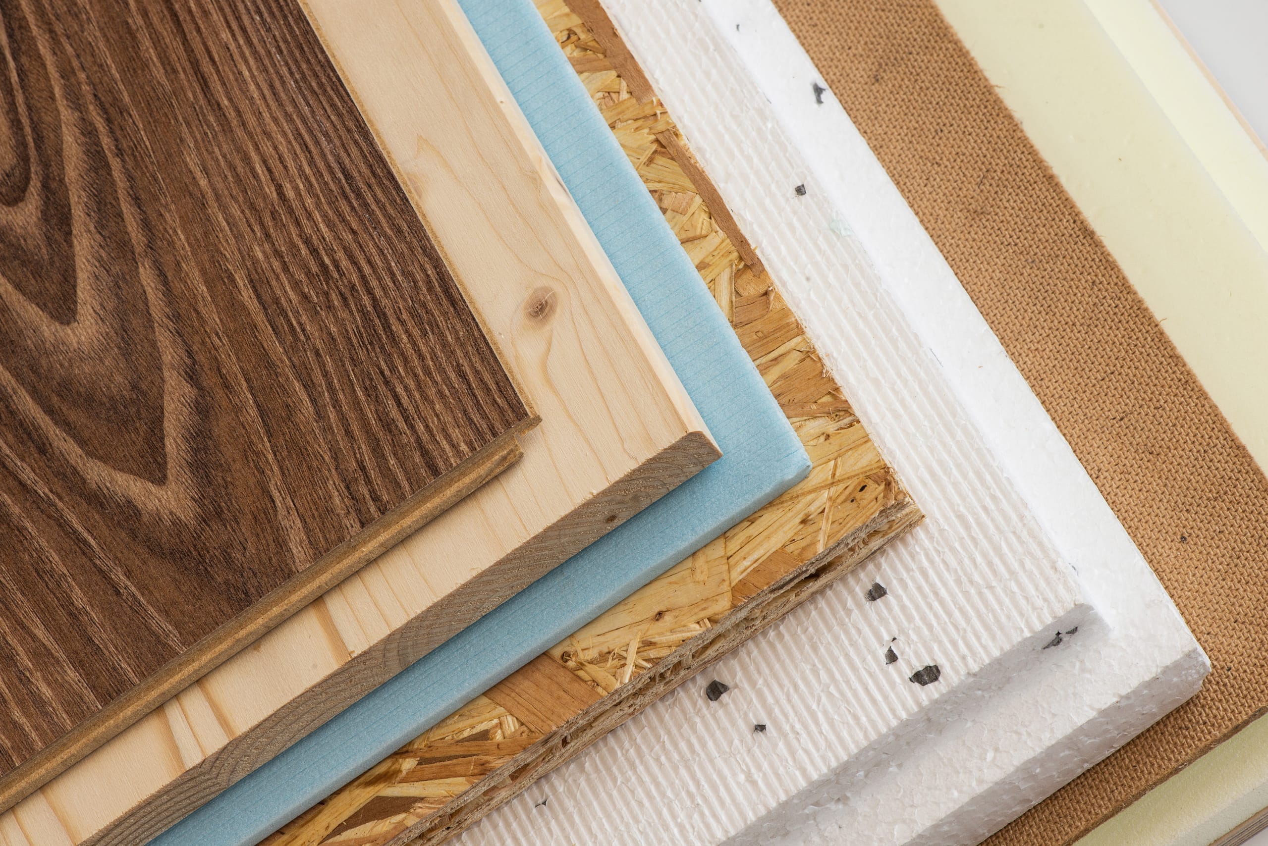 Stack,Of,Various,Construction,Supplies.,Insulation,Foams,And,Wood,Boards.