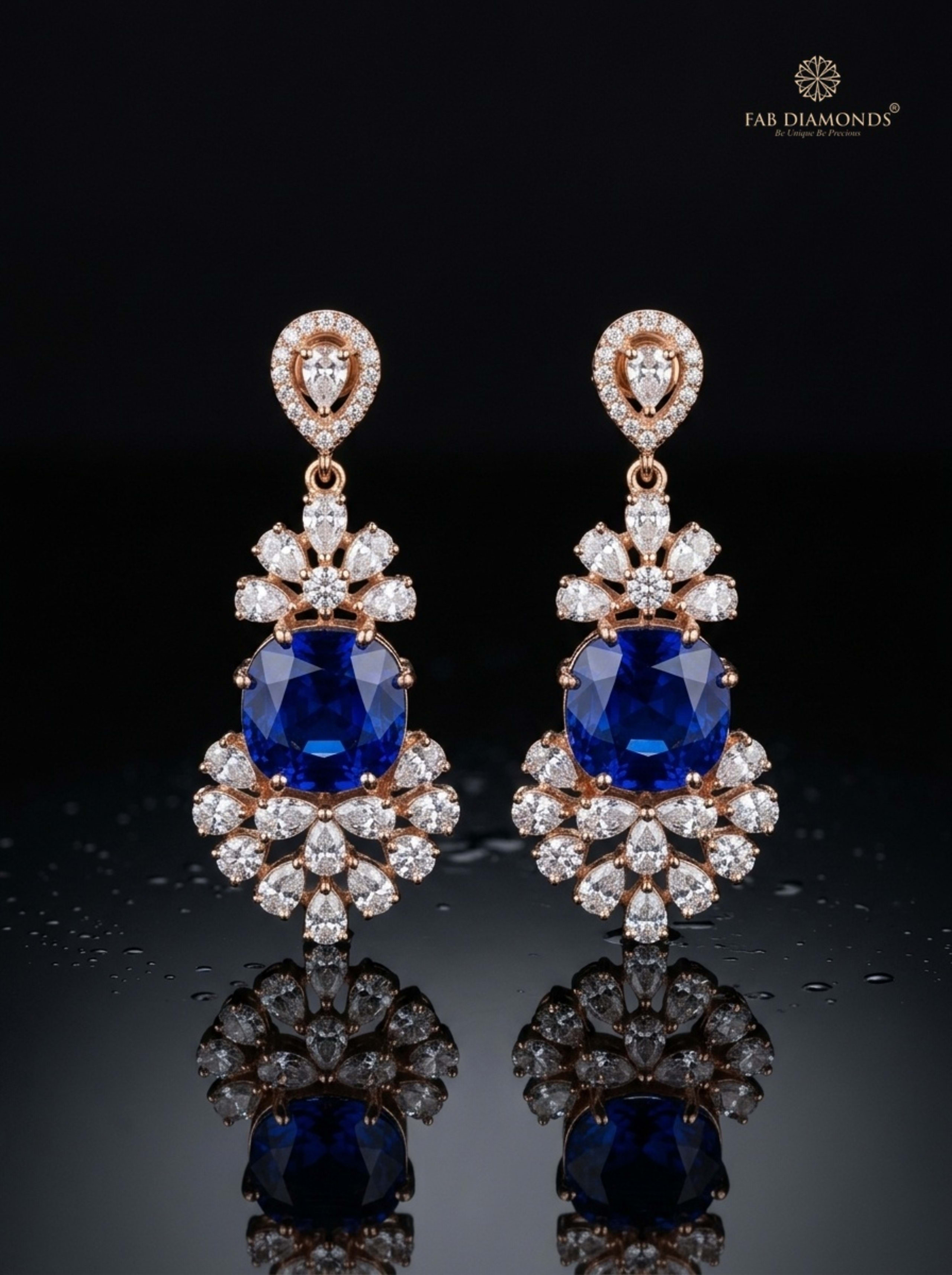 Royal Blue Neelam Sapphire and Diamond Drop Earrings on rustic dark wood