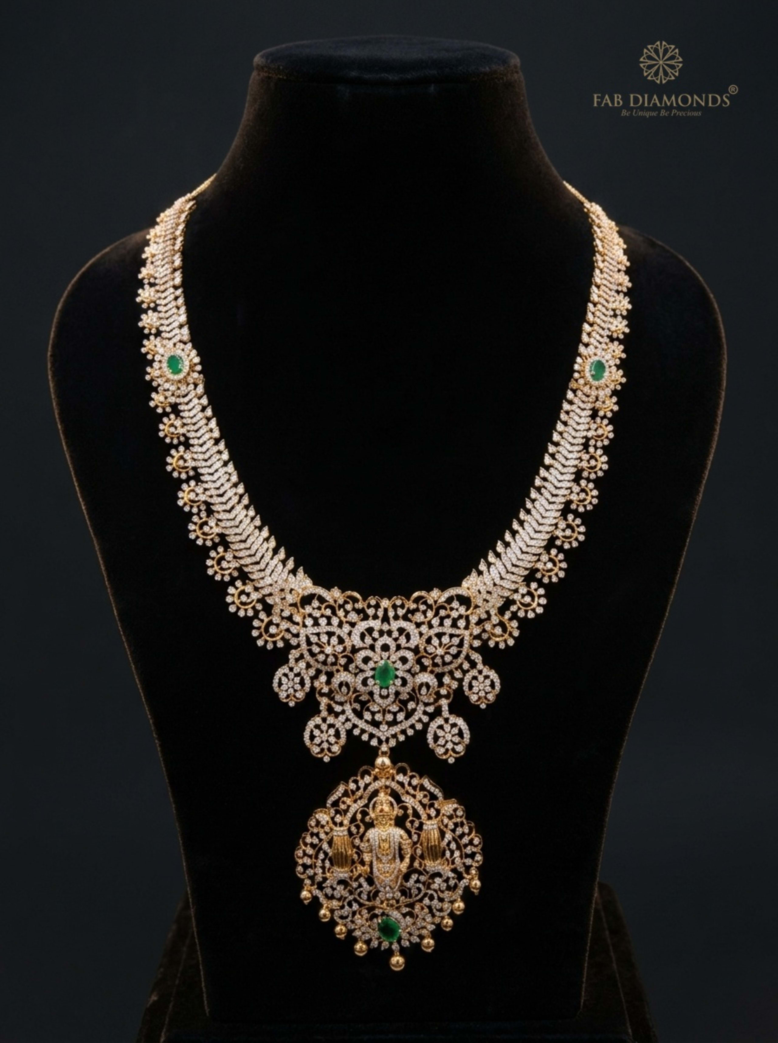 Chevron Diamond Strap Haram with Lord Venkateswara Temple Pendant on velvet bust with gold FAB logo