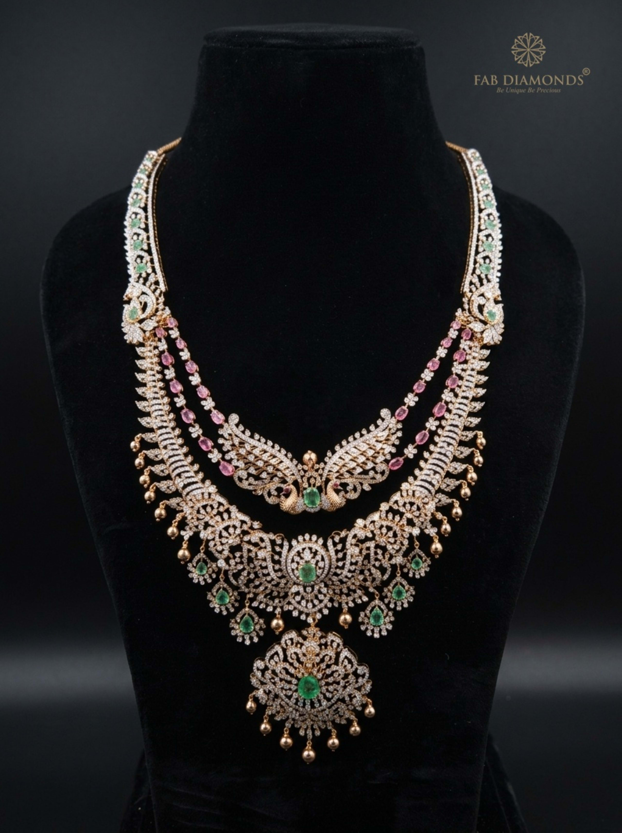 Double-Layer Diamond Swan Wing Haram with Pink Sapphire Beads on velvet bust with gold FAB logo