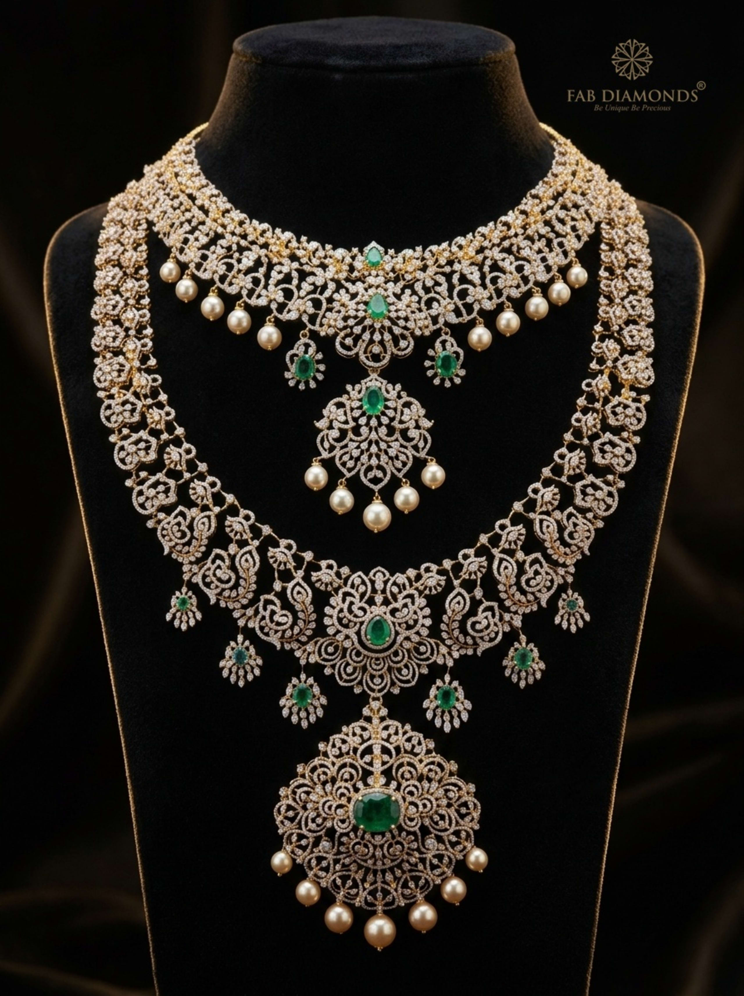 Matched Diamond Choker & Grand Oval Emerald Medallion Haram on velvet bust with gold FAB logo