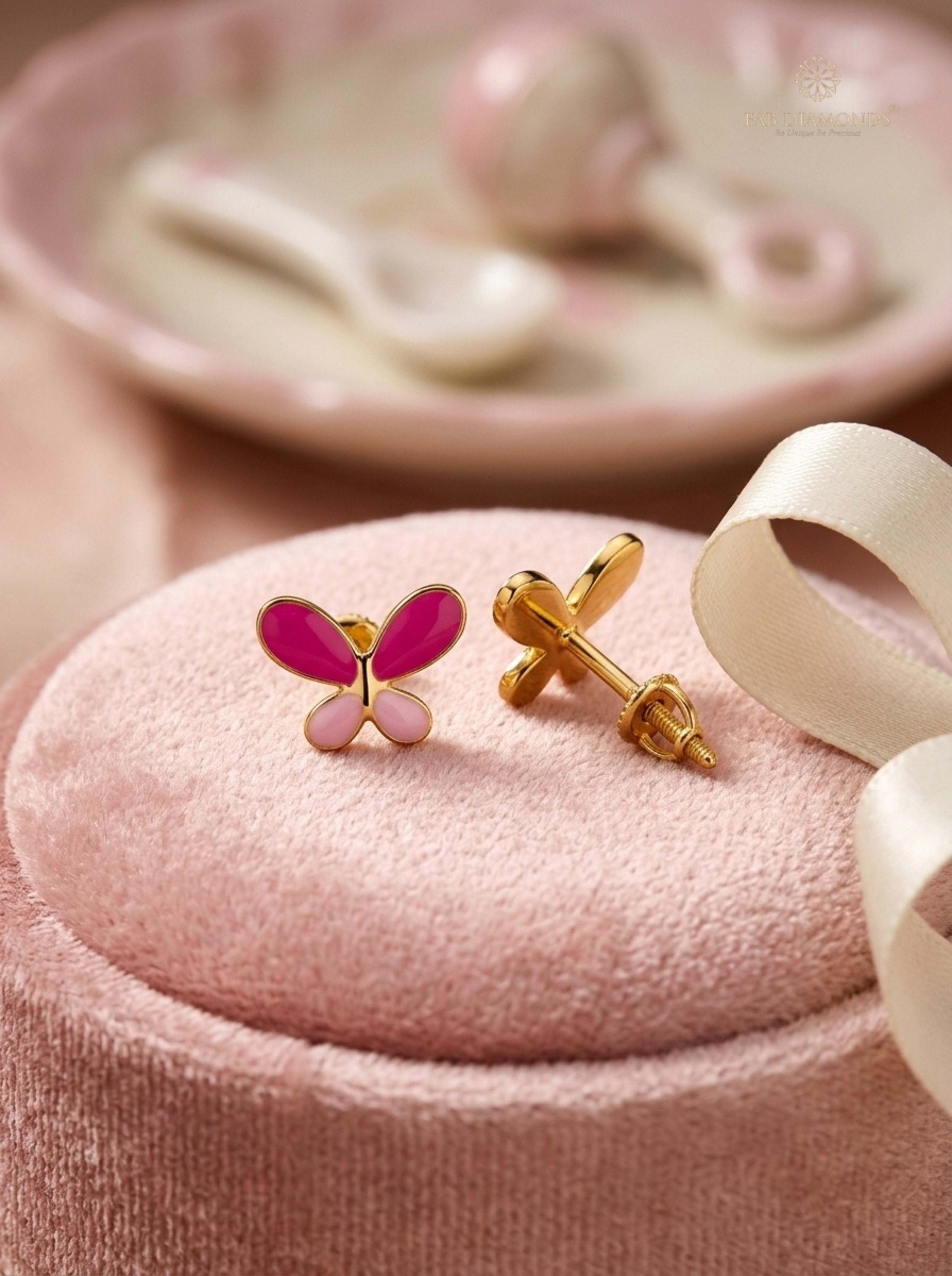 Titli Two-Tone Pink Butterfly Gold Baby Studs on pink velvet mount