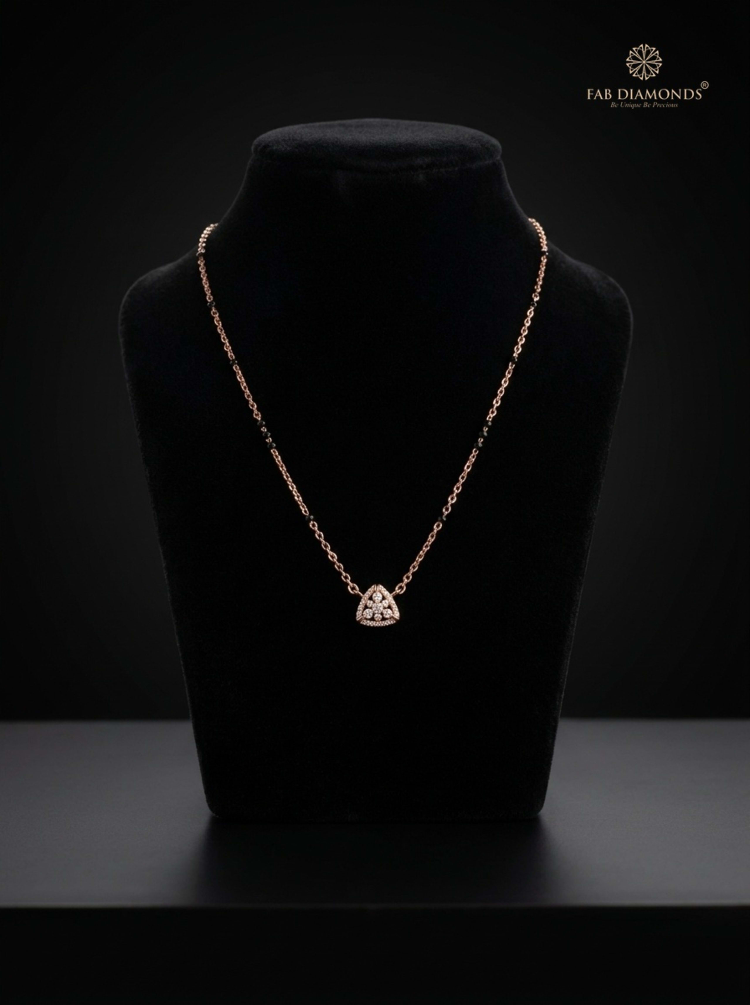 Ananya dainty rose gold triskele diamond mangalsutra on beige velvet jewelry tray