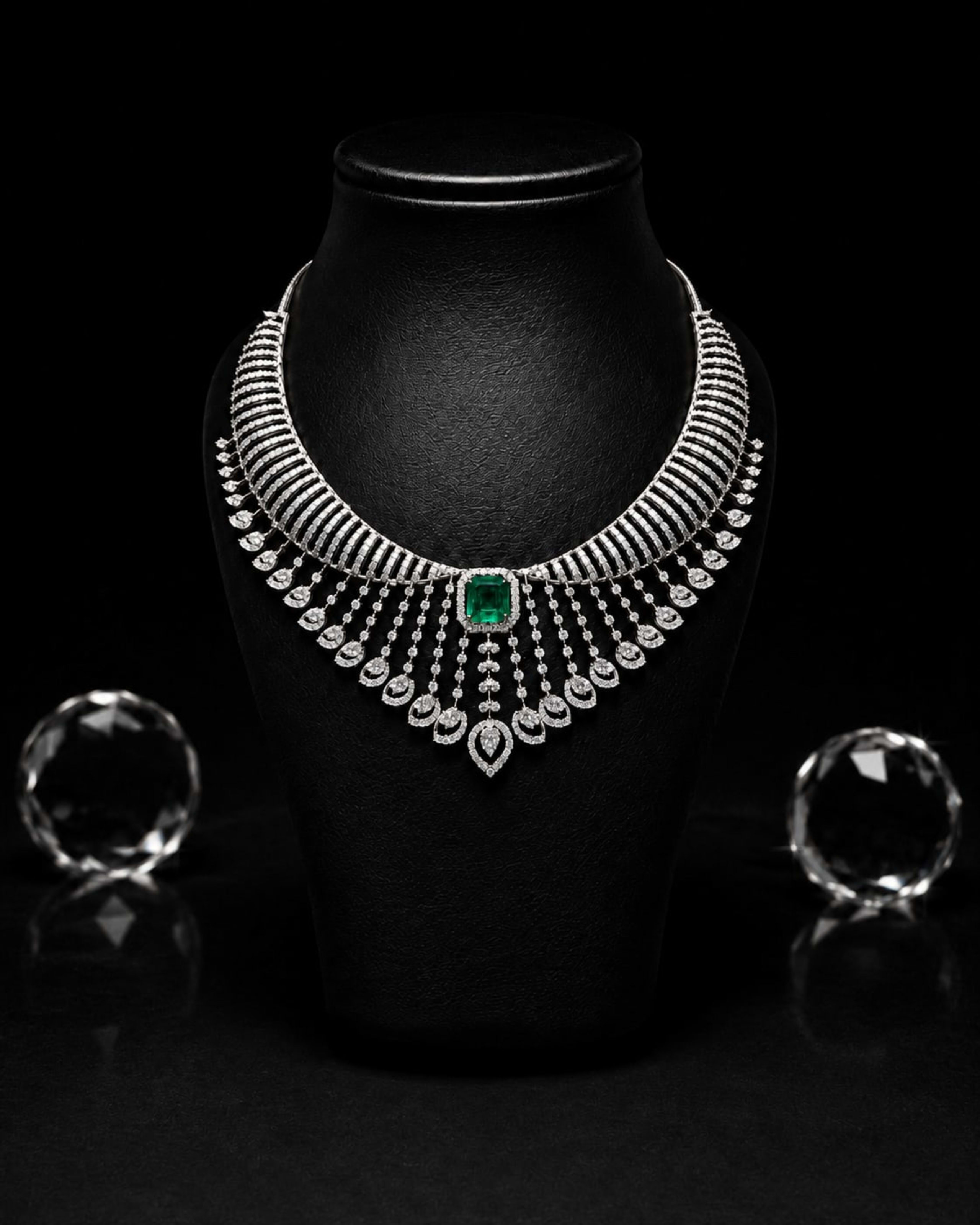 Fine Diamond & Emerald Necklaces