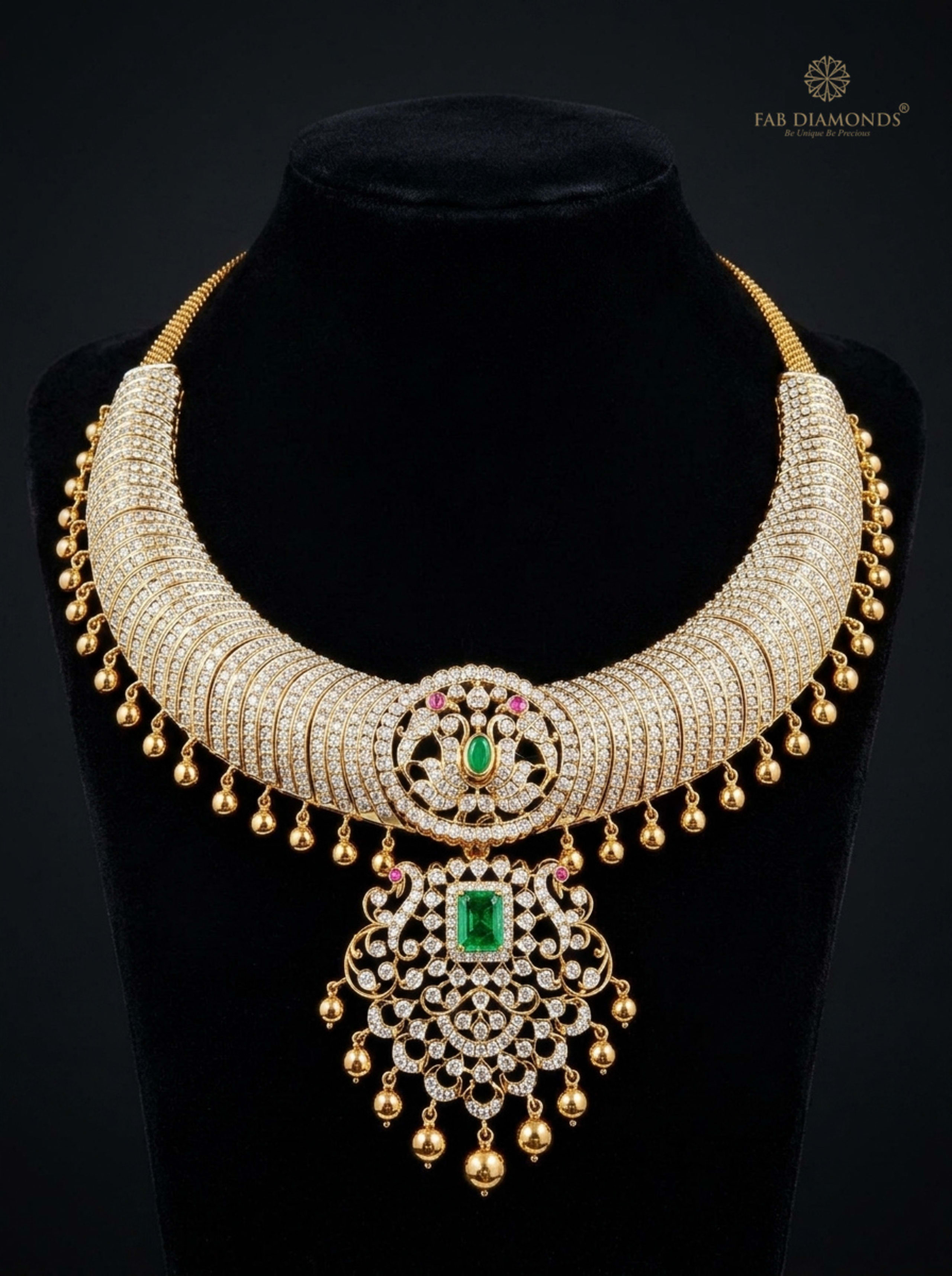 Mayura ribbed diamond torque collar with peacock medallion and emerald drop on matte black velvet bust