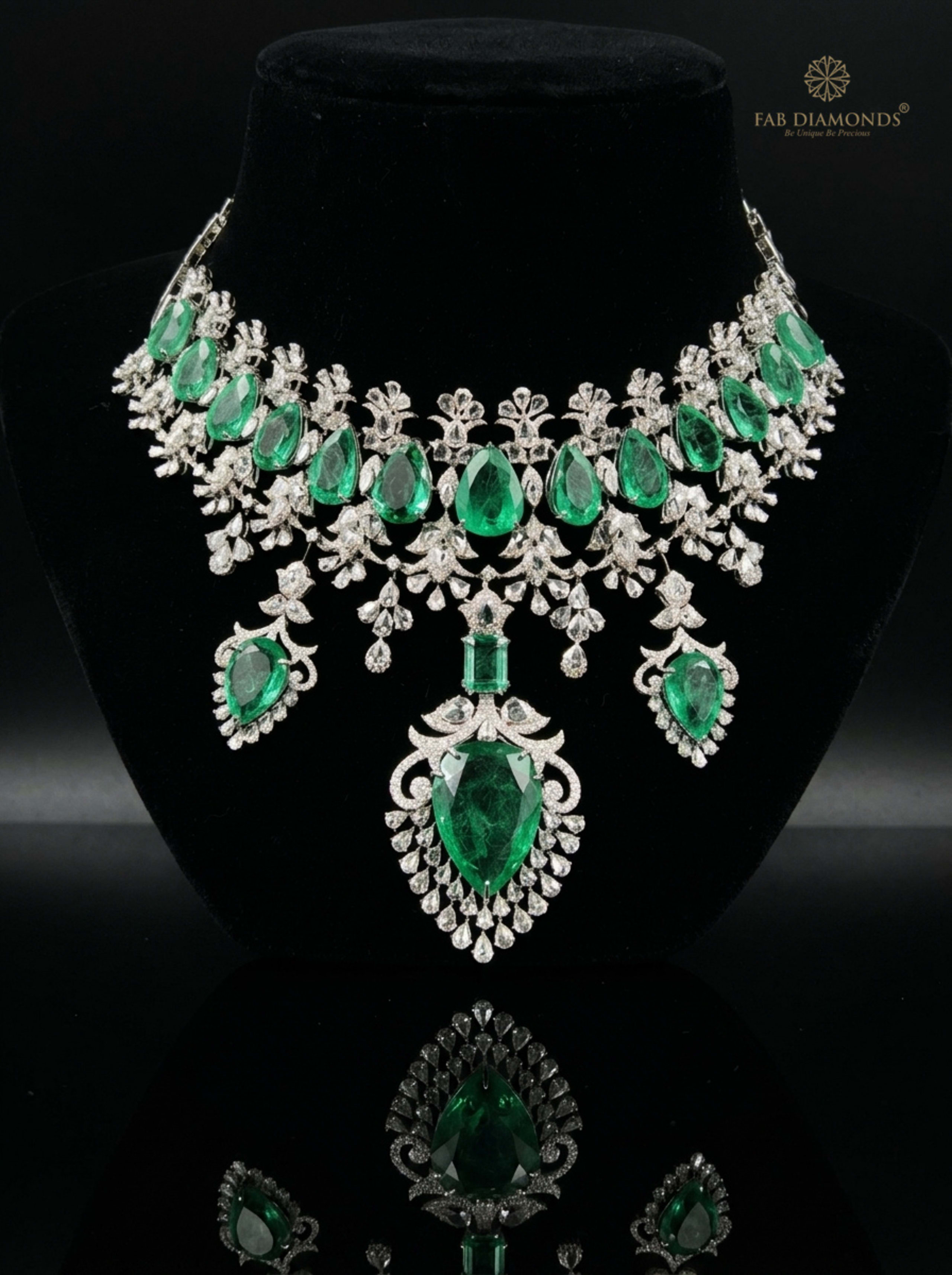 Samriddhi imperial pear emerald cascade diamond choker on black velvet bust with obsidian reflection