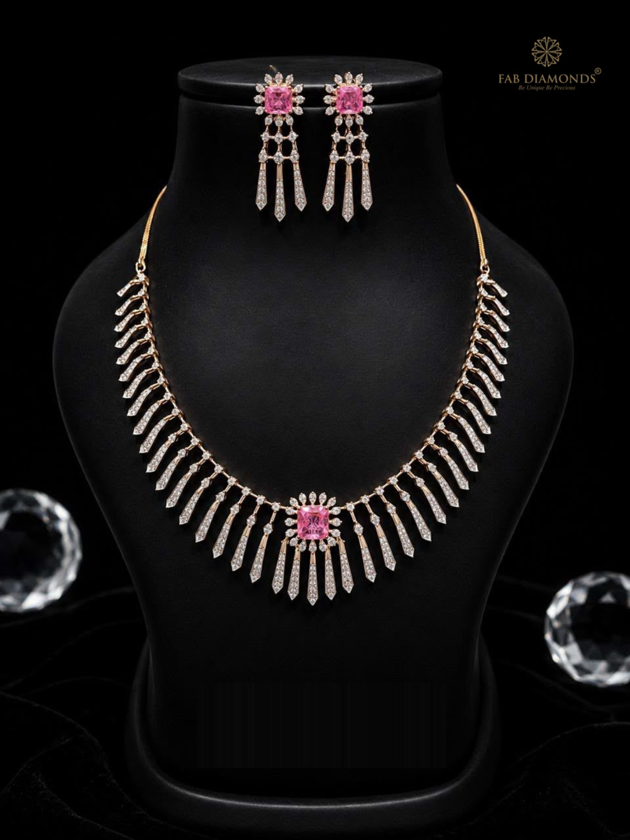 Roshni pink rubellite cushion and diamond needle fringe suite on matte black velvet bust with crystal accents