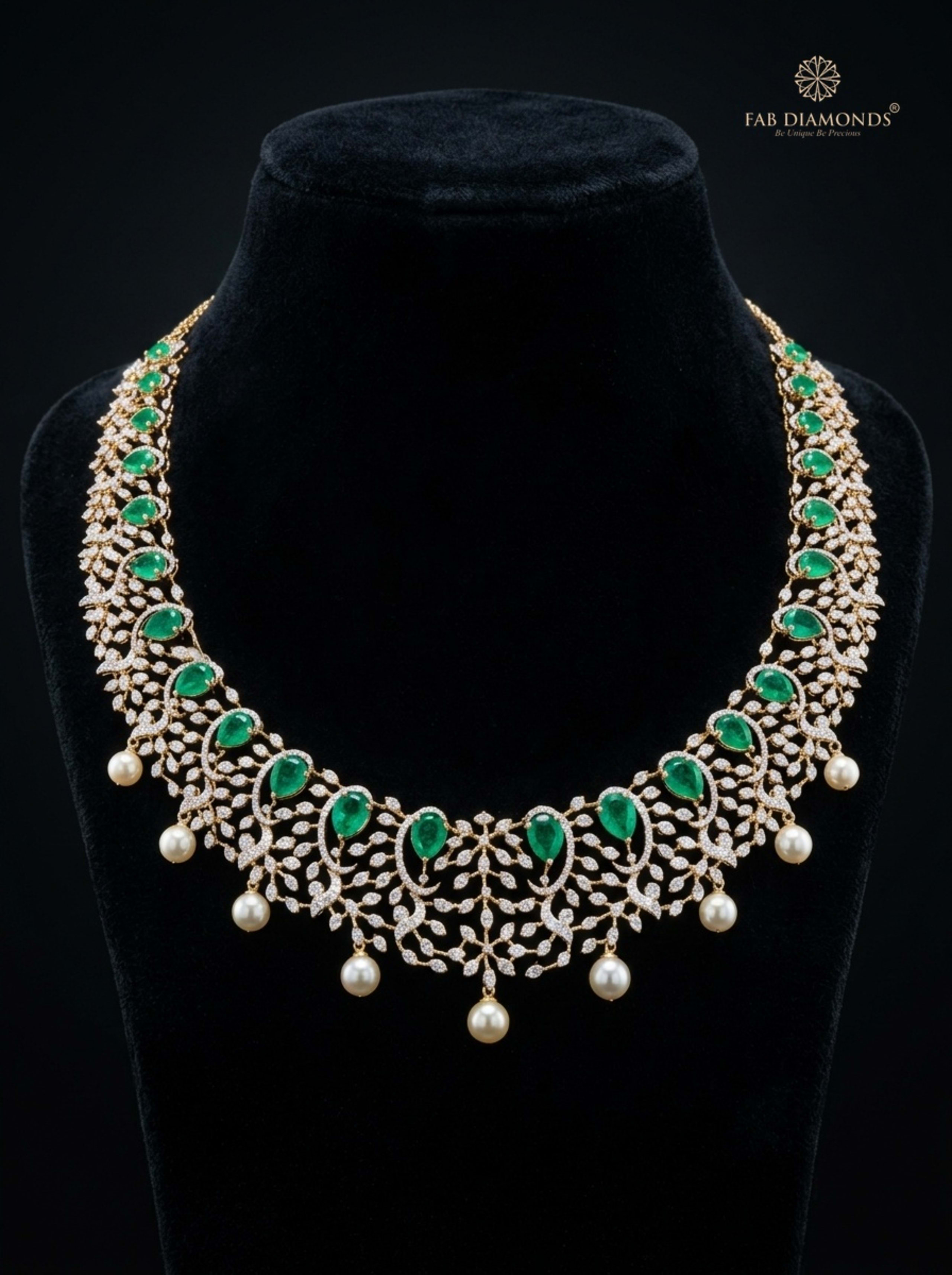 Muktavali pear emerald and South Sea pearl scalloped diamond collar on luxury velvet bust