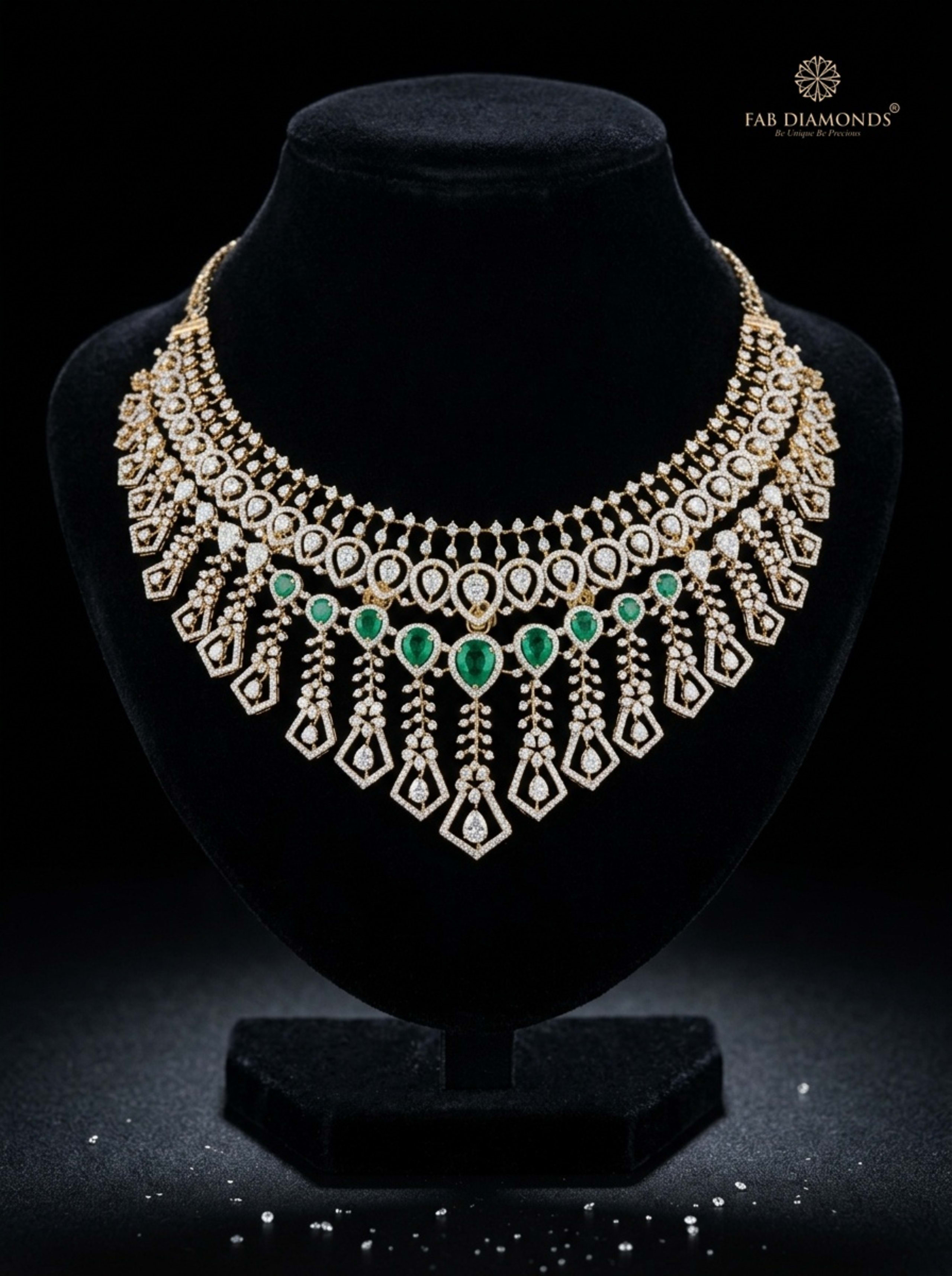 Padmavathi double-row heart emerald and chevron diamond bib necklace on luxury velvet bust