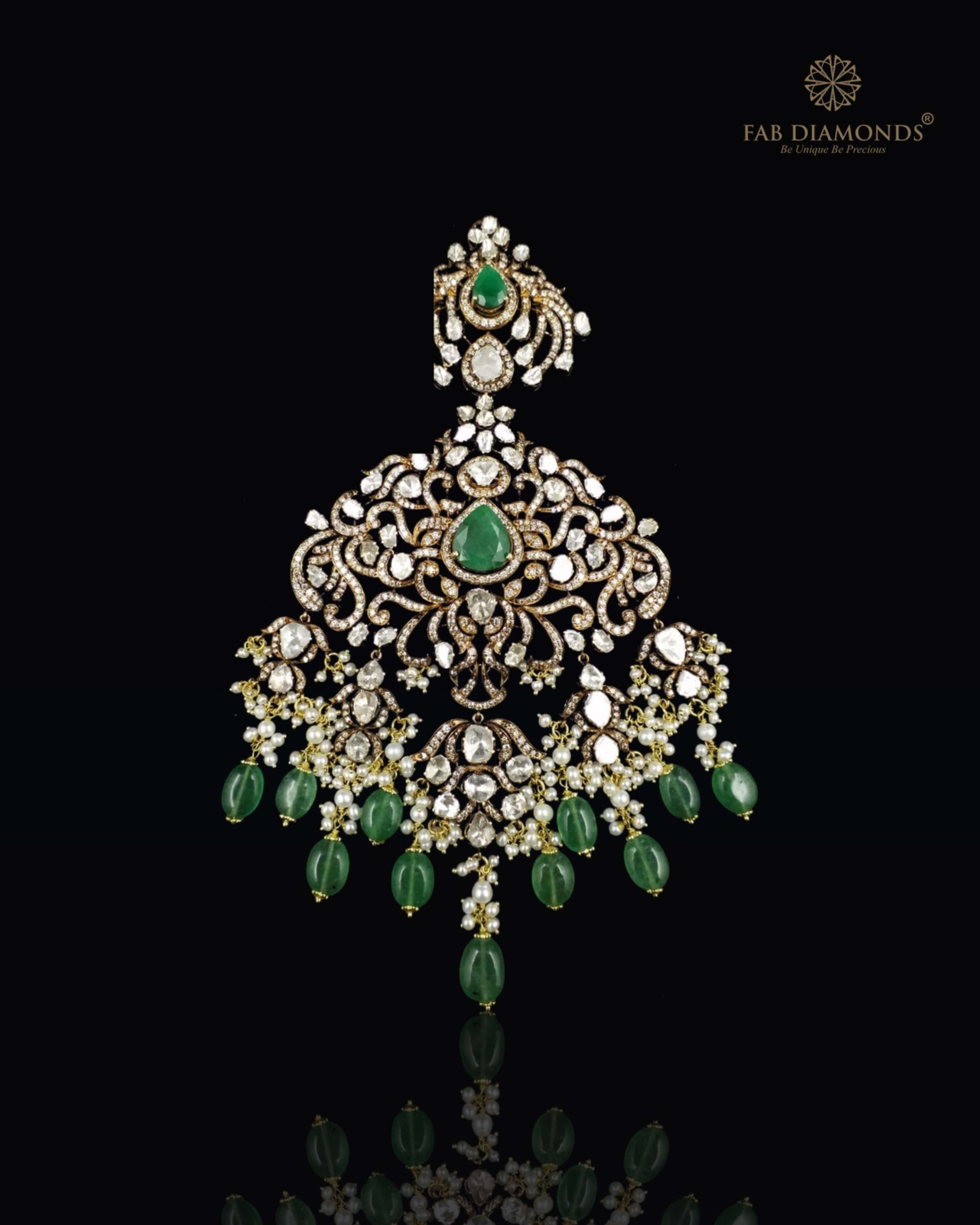 Devika polki diamond and carved emerald chandelier pendant on museum black velvet plinth