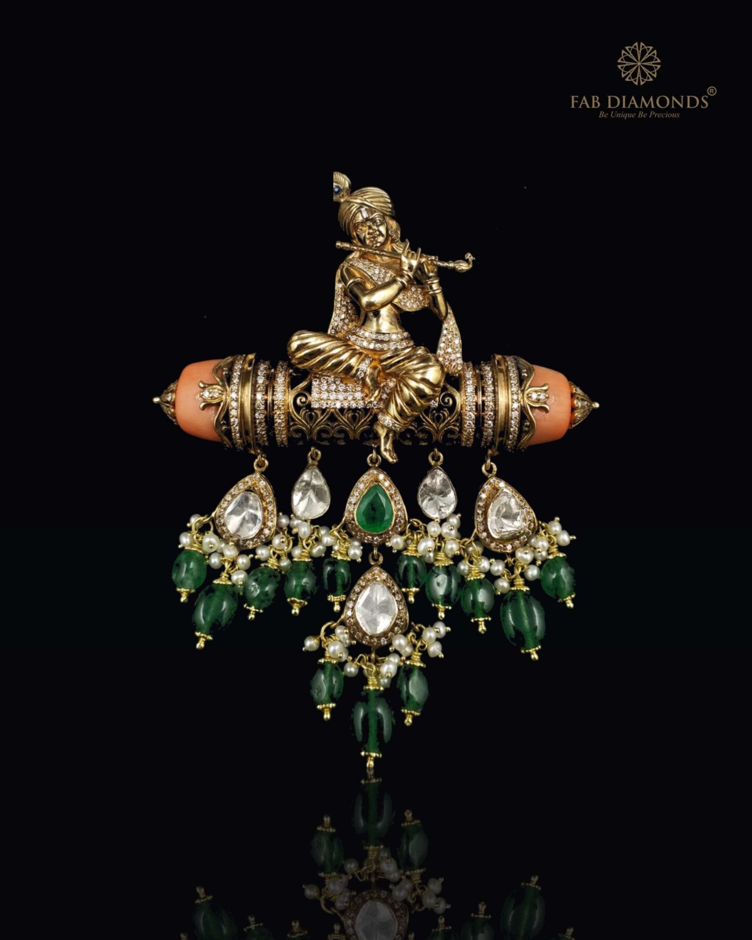 Krishna temple flute and carved coral masterpiece pendant on obsidian plinth with specular reflection