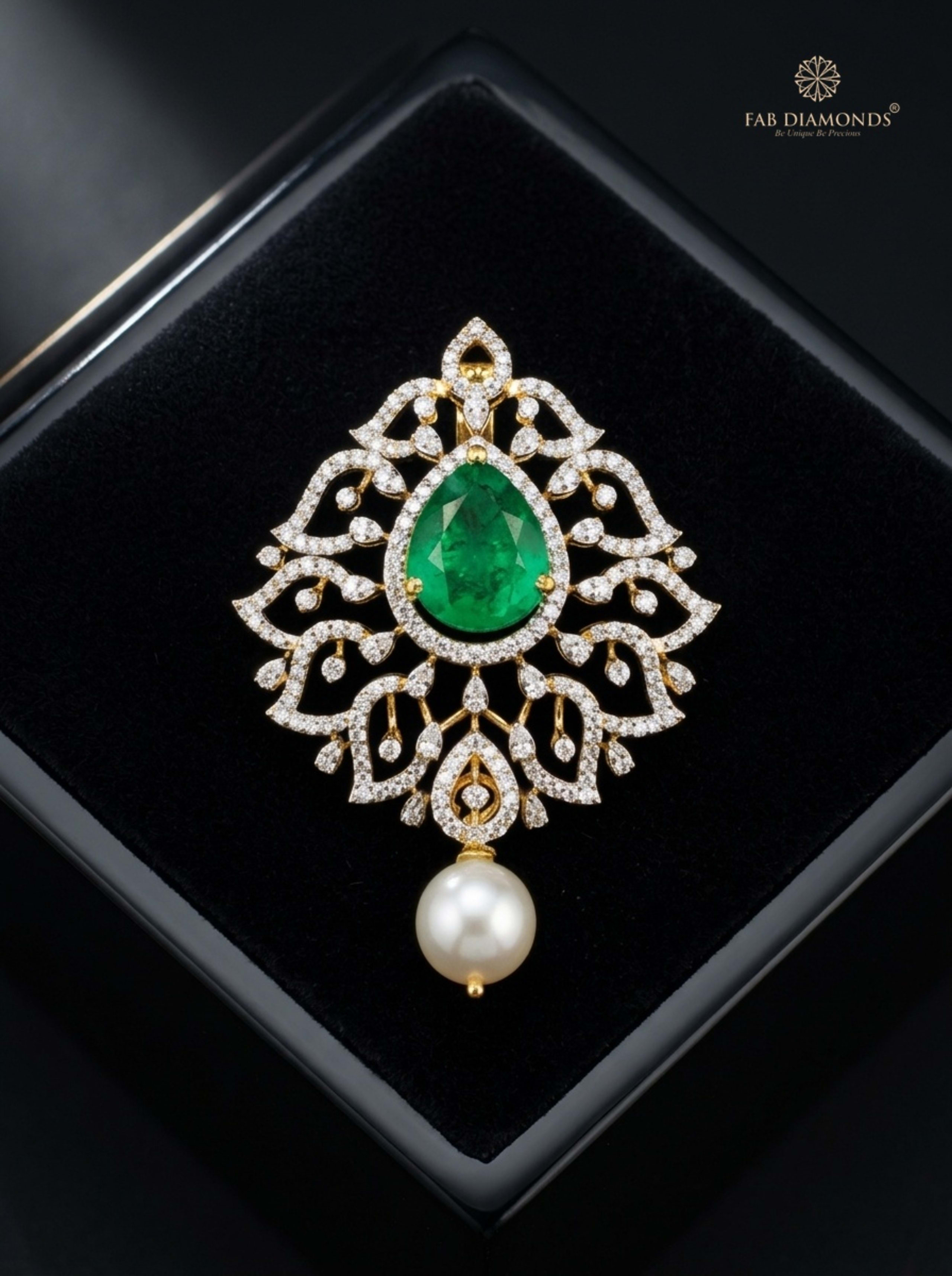 Malini ruby and emerald chandelier drop pendant on soft ivory scalloped linen plate