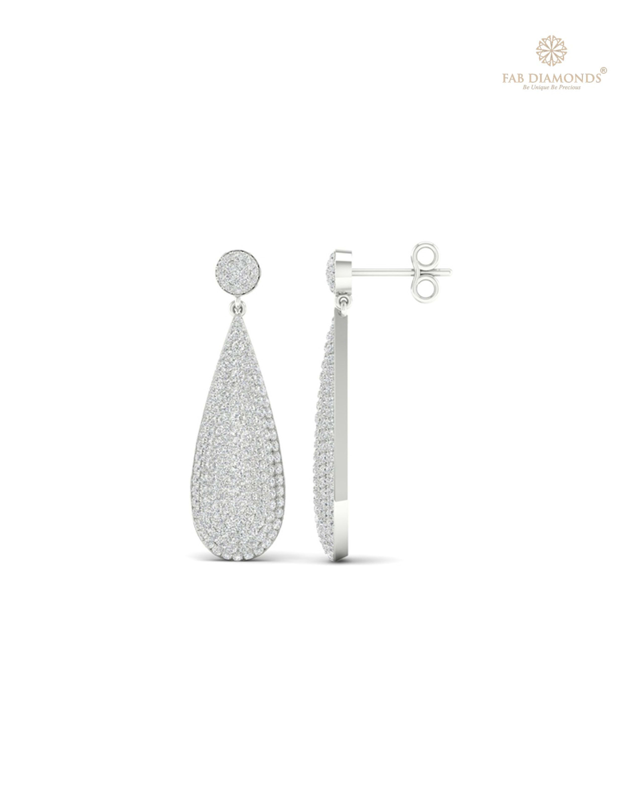 The EF05470 Royal Chandelier Diamond Earrings (1.06 Cts) on white atelier plate with FAB hallmark