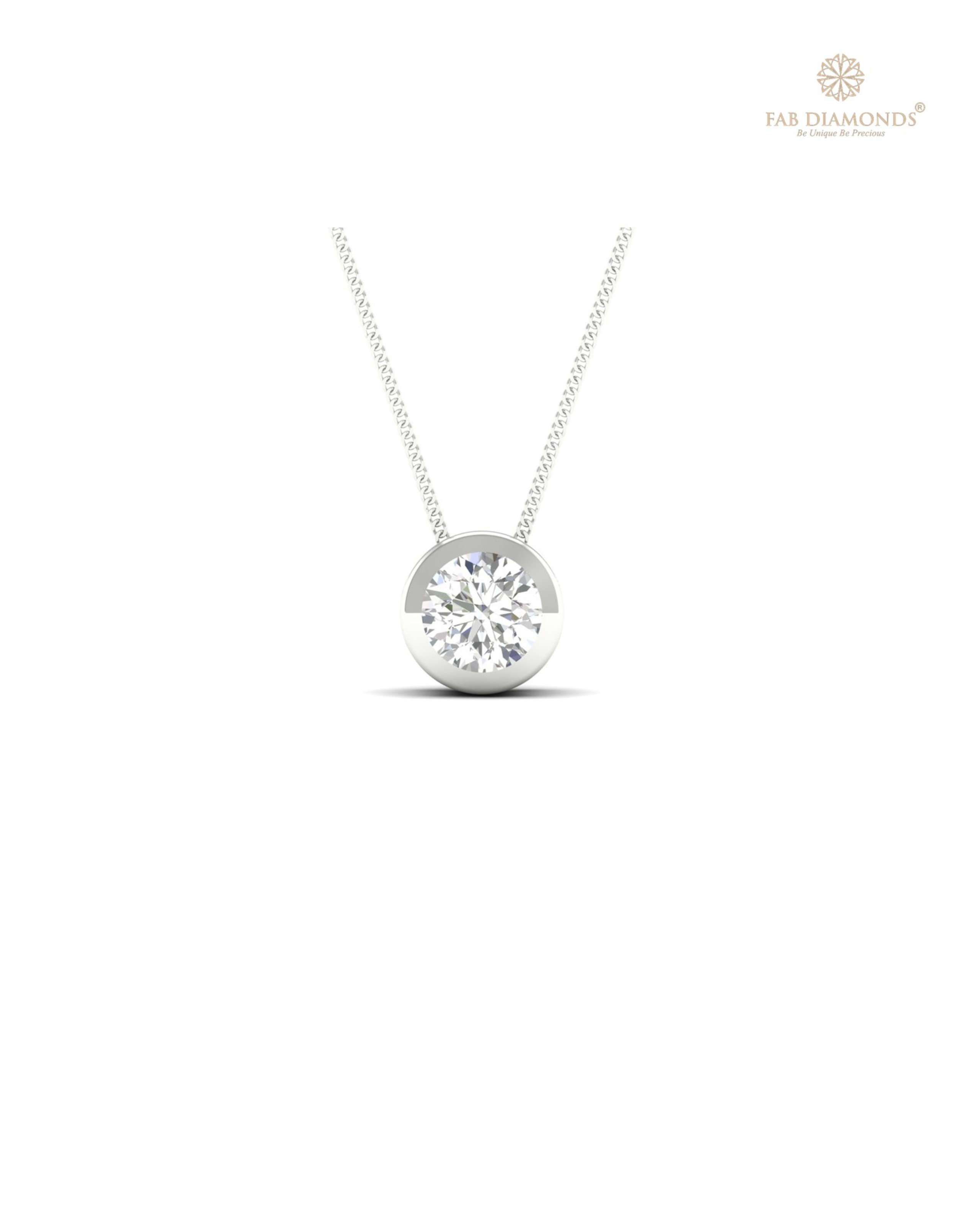 The PS00018 Floating Solitaire Diamond Pendant (0.20 Cts) on white atelier plate with FAB hallmark