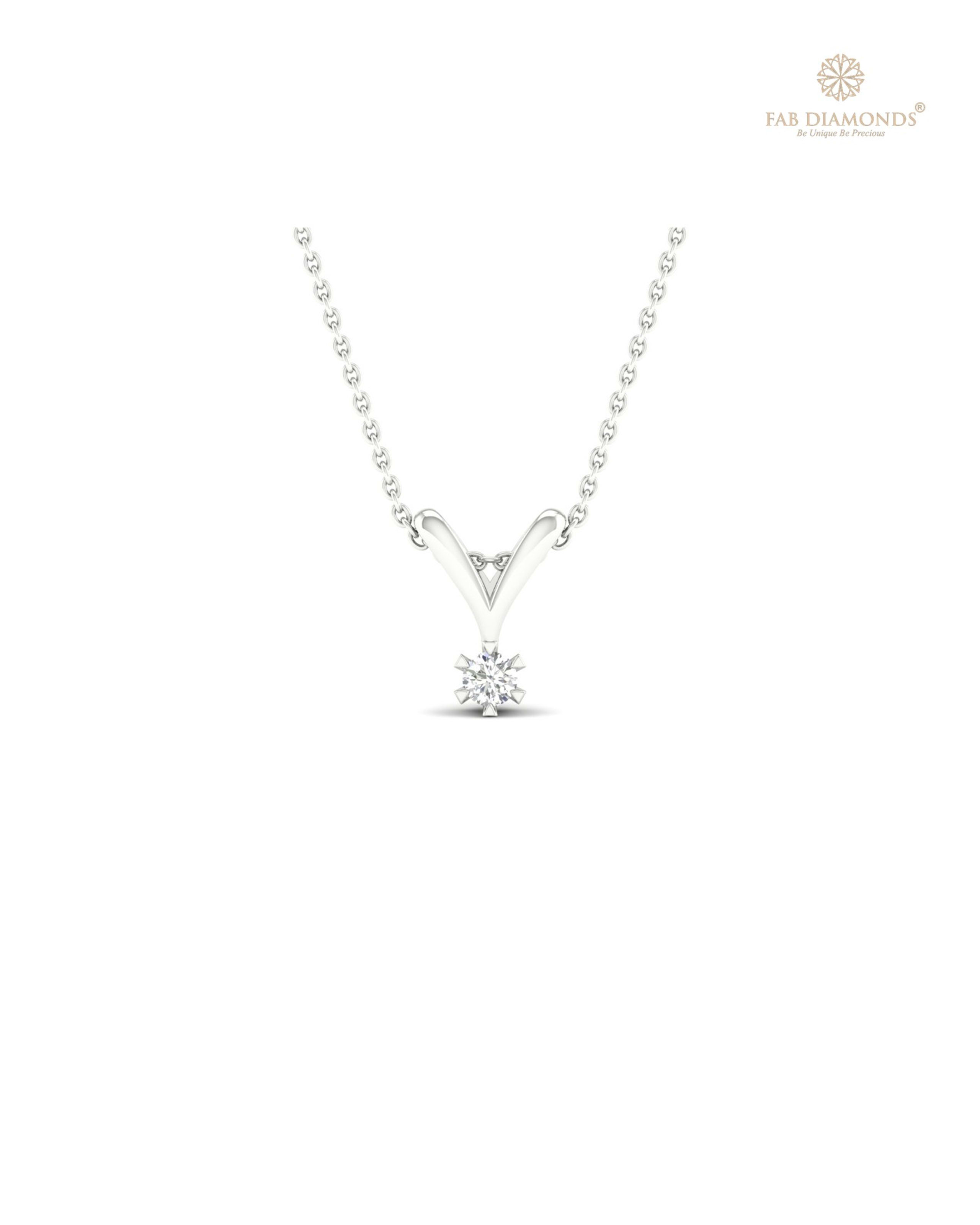 The PS00023 Floating Solitaire Diamond Pendant (0.04 Cts) on white atelier plate with FAB hallmark
