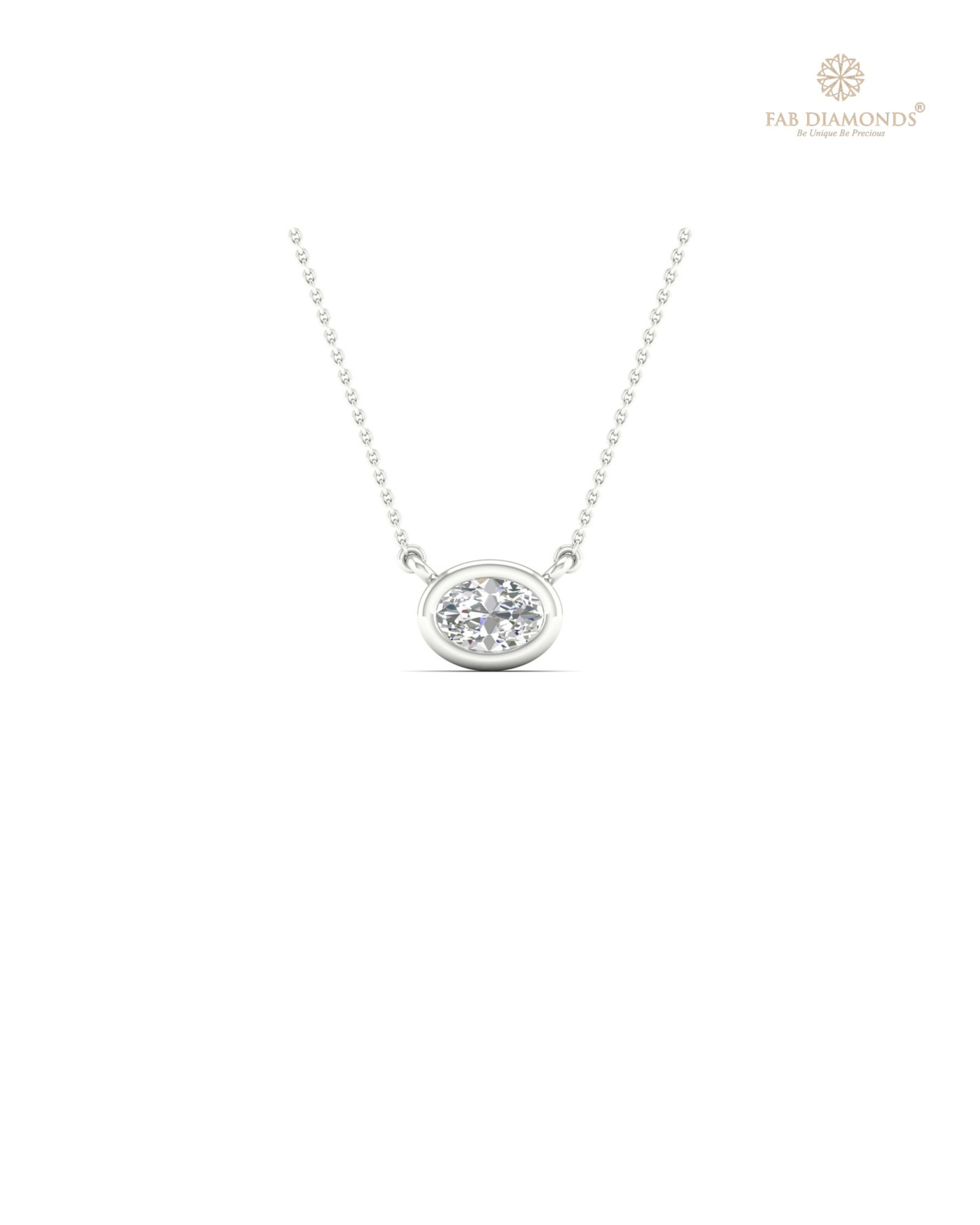 The PS00315 Floating Solitaire Diamond Pendant (0.21 Cts) on white atelier plate with FAB hallmark