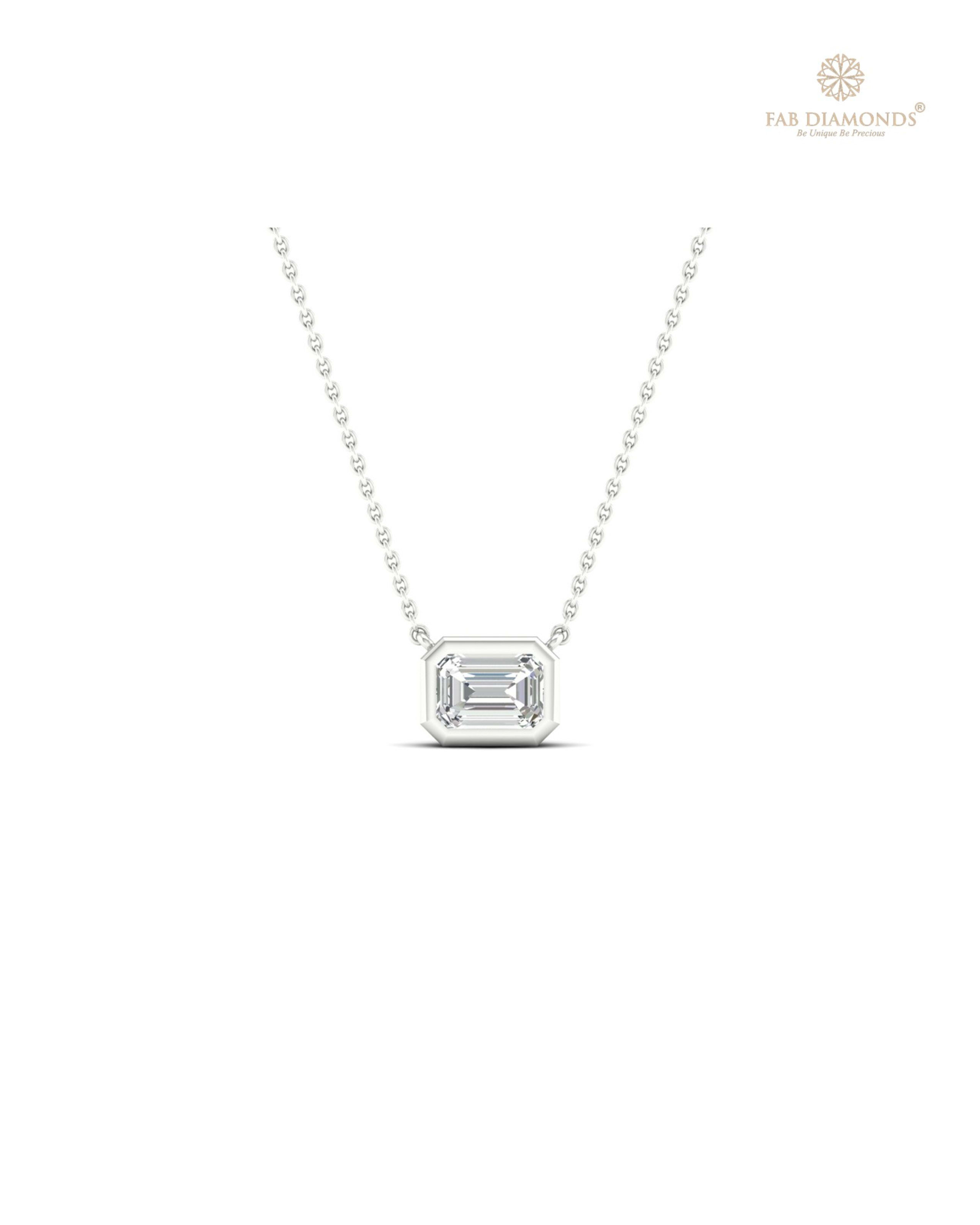 The PS00333 Floating Solitaire Diamond Pendant (0.20 Cts) on white atelier plate with FAB hallmark